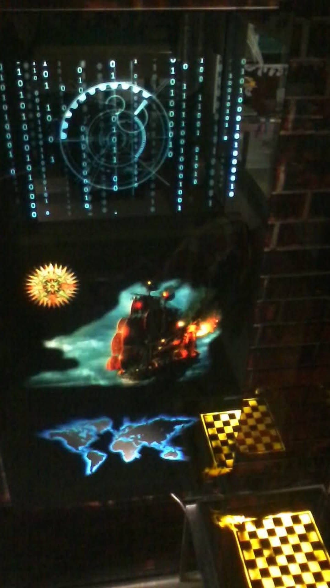 LED glass work illuminated in a dark room.
